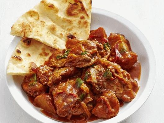 Photo Butter Chicken - kuřecí omáčka z indického stylu a smetanová rajčatová omáčka v pomalém hrnci