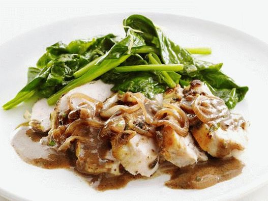 Fotografie z kuřecího pečeně v troubě s rozmarýnem