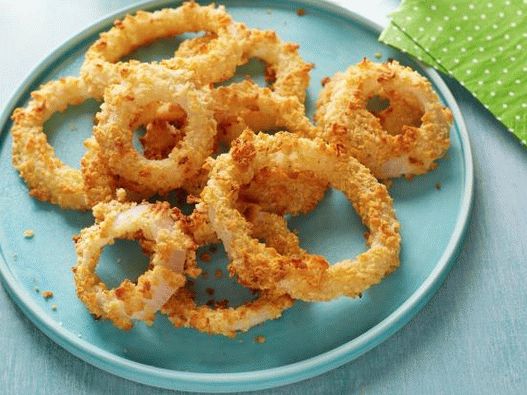 Foto cibulové kroužky v troubě