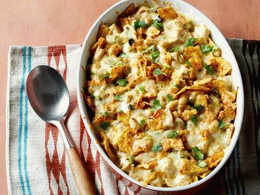 Photo Hot casserole with chicken and tortilla chips